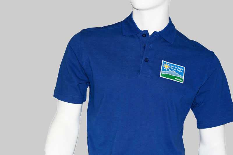 Poloshirt Migros bestickt